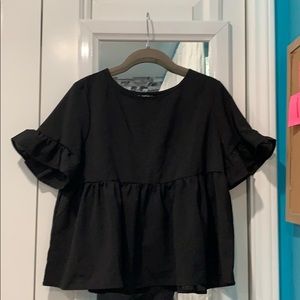 black ruffle shirt